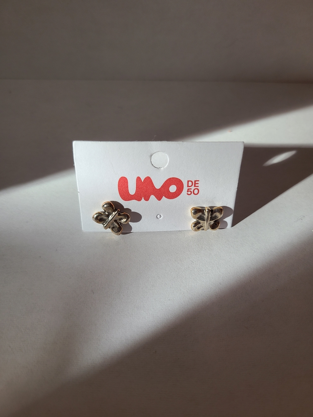 UNO de 50 Gold Butterfly Stud Earrings with Vintage Shine